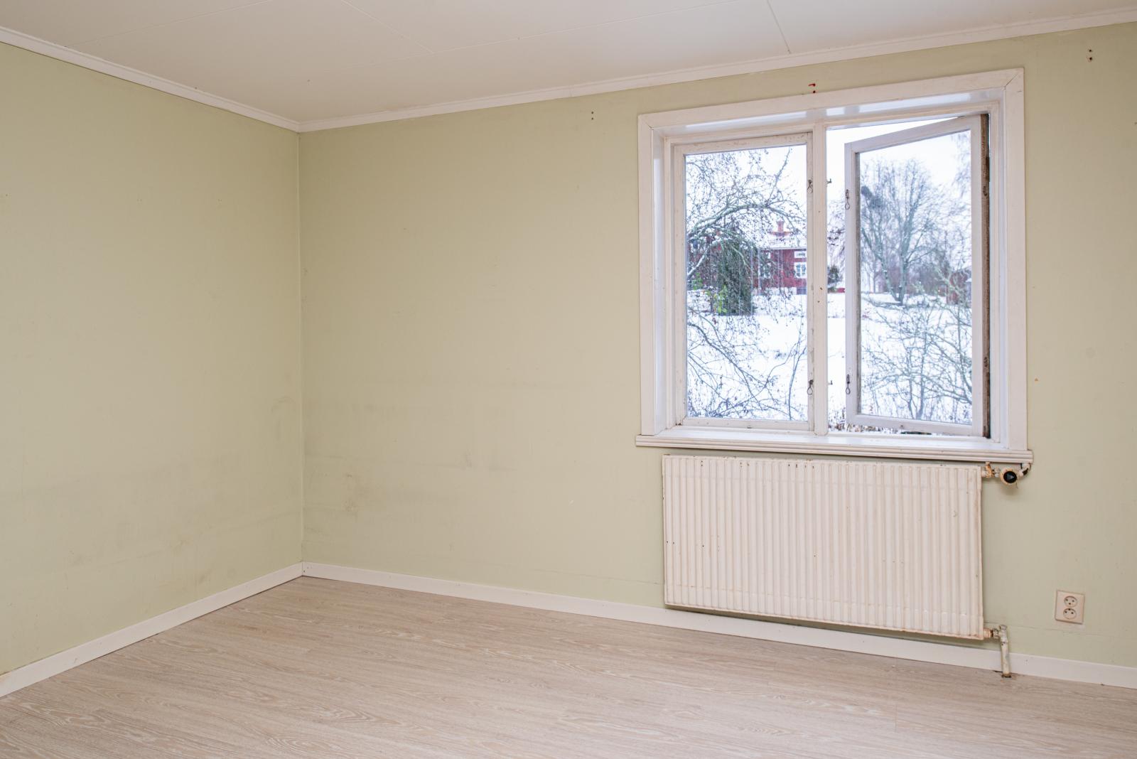 Kammare innanför köket