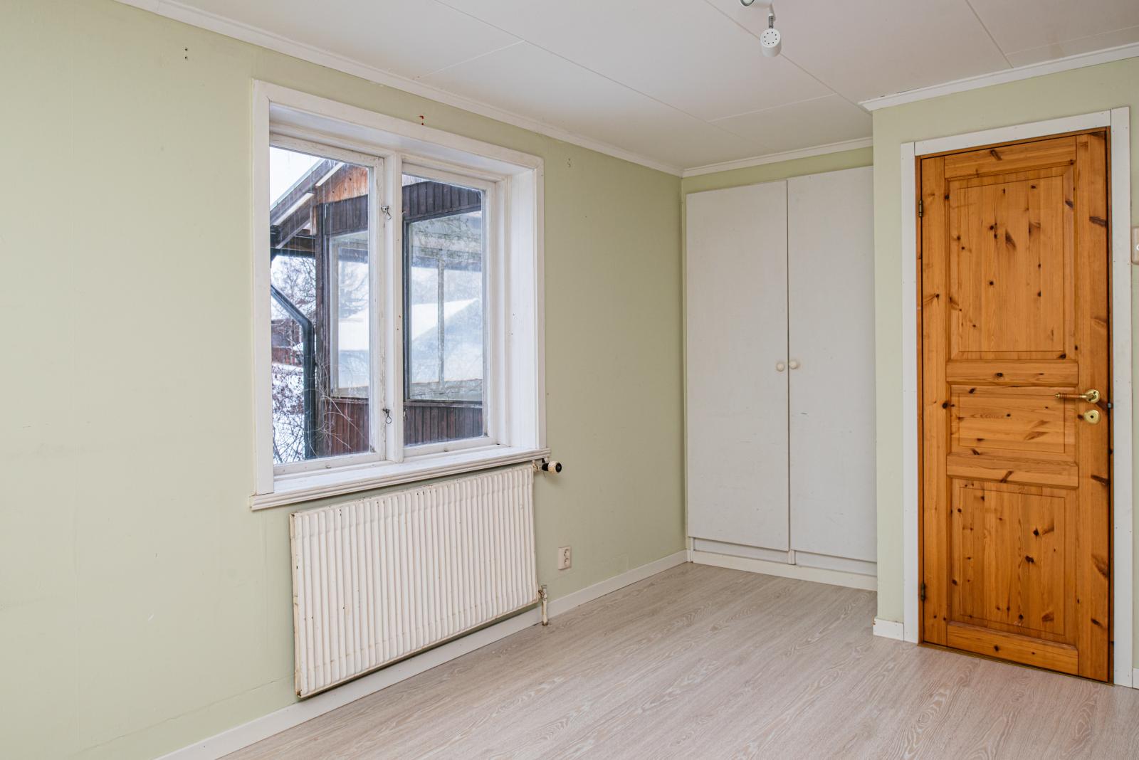 Kammare innanför köket